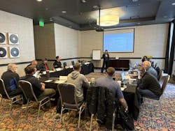 Erin Solis leads a training group. Erin Solis leads a training group.