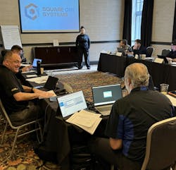 Kristen Henry leads a training group. Kristen Henry leads a training group.