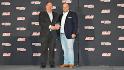 Best Repair Planner/Estimator Will Barkley, of K&M Collision in Hickory, North Carolina, receives his award from Jay Sicht.