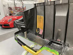carbon_fiber_repair_red_porsche_in_background carbon_fiber_repair_red_porsche_in_background