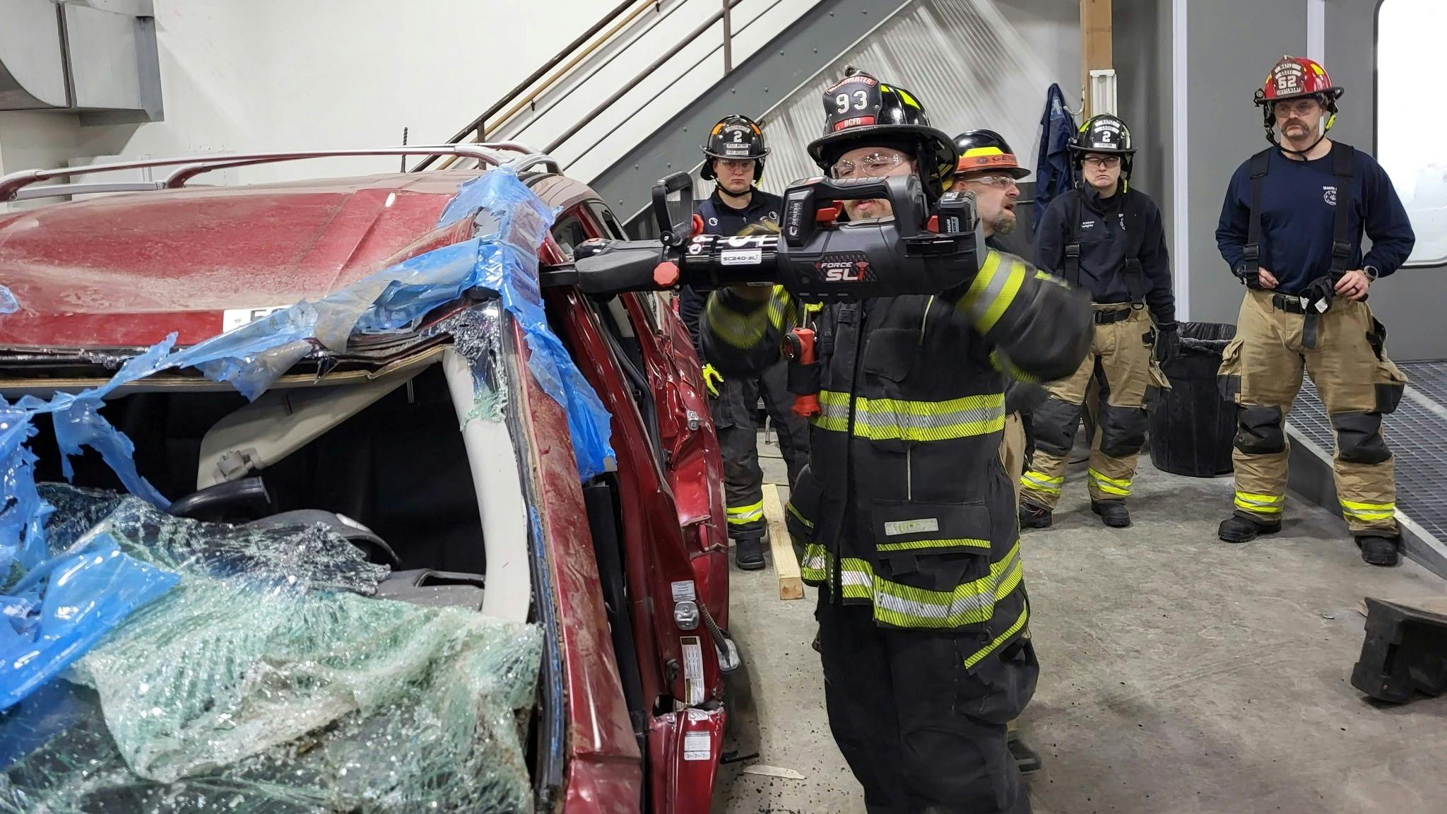 Rescue units from across the Minneapolis area donned their gear for hands-on vehicle extrication training from the NABC F.R.E.E. program at the CARSTAR location in New Hope, Minnesota.