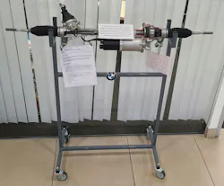 ILLUSTRATING SAFETY: Outside his office, Pacific BMW's Andrew Batenhorst keeps a steering gear cutaway with placards describing BMW's requirements for replacement. This helps explain to customers the importance of these safety inspections. ILLUSTRATING SAFETY: Outside his office, Pacific BMW's Andrew Batenhorst keeps a steering gear cutaway with placards describing BMW's requirements for replacement. This helps explain to customers the importance of these safety inspections.