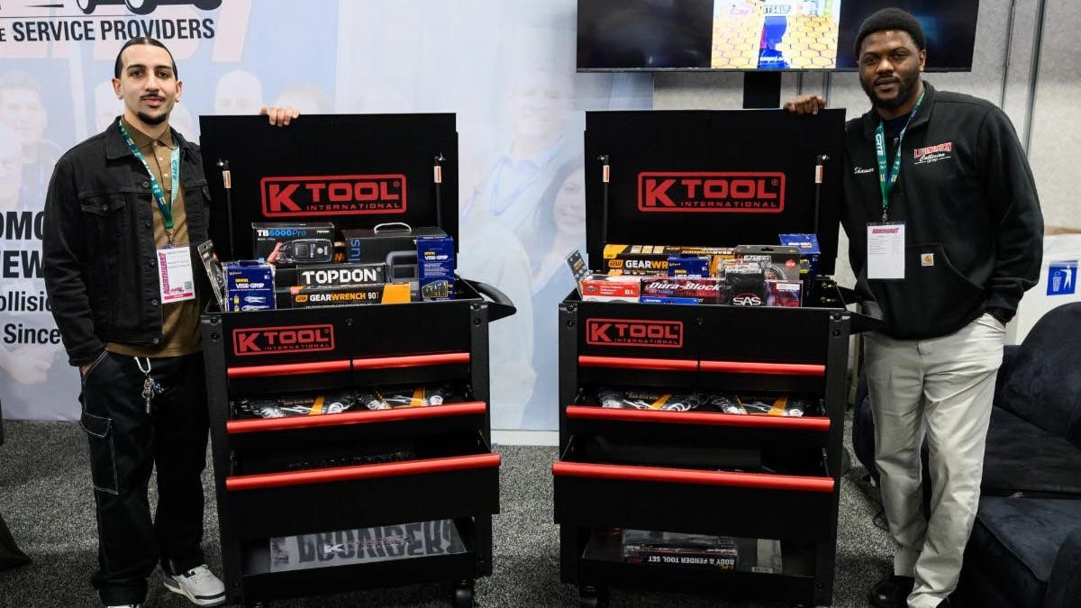 Young Technician of the Year Award recipients Christopher Edmonson, left, and Shamar Lewis.