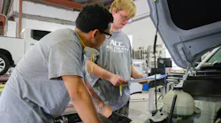 PRODUCTIVE APPRENTICESHIPS: At All County Collision, less-experienced team members, such as Aidan Richardson (r.) take on foundational tasks under close supervision.