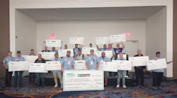 BENCHMARK AWARDS: Award recipients show off their big checks during the CREF Benchmark Awards Breakfast at the 2025 SEMA Show.