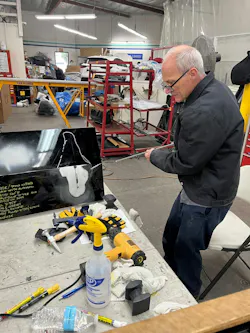 This photo shows the PDR push tool in use.