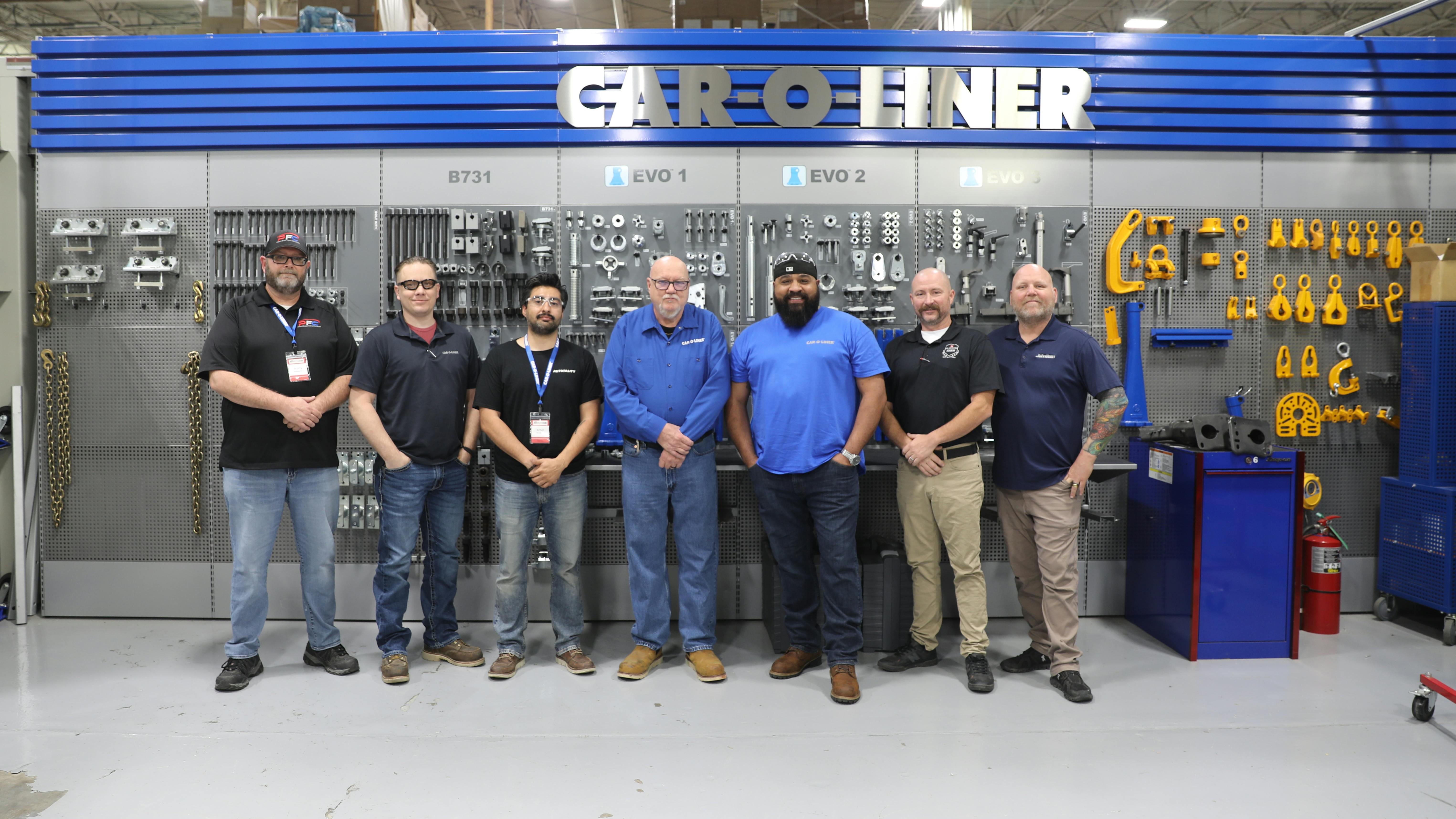 RIGHT TOOLS FOR THE JOB: Juan Carlos Gasga Perez, third from right, showcases the repair techniques he and his team use at Premier Auto Body on his social media @Autobodystrong.
