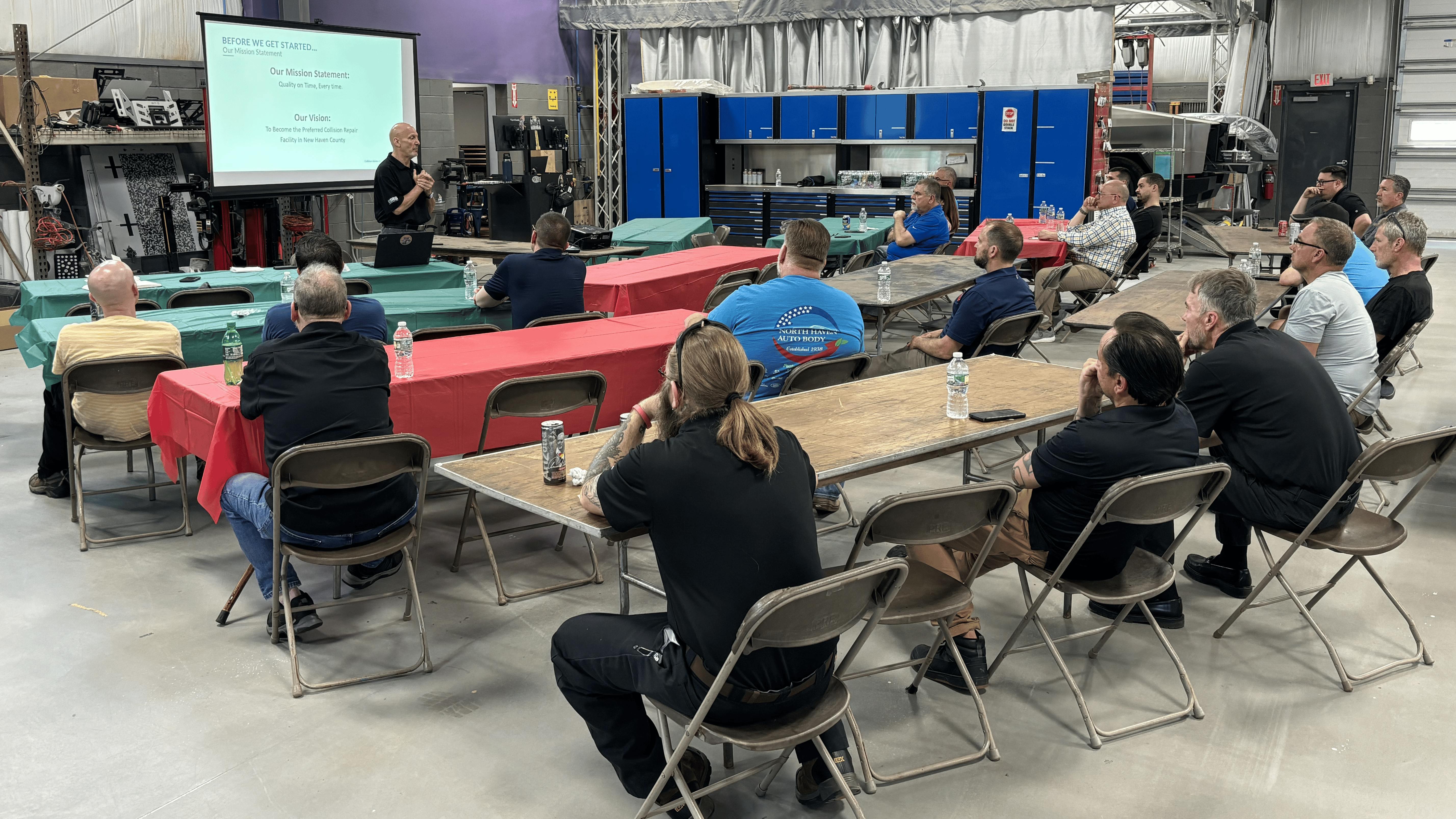 ON THE SAME PAGE: Mike Anderson of Collision Advice shares industry data and advice for parts wholesalers during a Parts Managers Meeting at North Haven Auto Body in North Haven, Connecticut, on May 19.