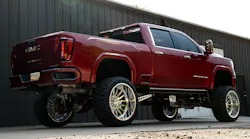 FLYING HIGH A GMC Sierra Denali recently received a lift kit, custom wheels, and more at Defiant Motorsports.