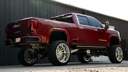 FLYING HIGH A GMC Sierra Denali recently received a lift kit, custom wheels, and more at Defiant Motorsports.