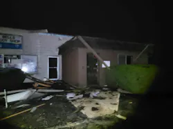DEBRIS: The front of the shop after the tornado hit.