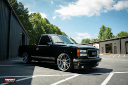 A SMOOTH RIDE A modded GMC Sierra complete with a dropped suspension and custom wheels.