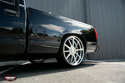 A SMOOTH RIDE A modded GMC Sierra complete with a dropped suspension and custom wheels.