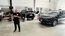 Autel Regional Manager Kevin Oliver prepares to perform a hands-on demonstration of the Autel IA700 ADAS System during Revv's Driving Forward: ADAS & Repair Readiness Summit in Boston at ADAS Diagnostic Solutions in Auburn, Massachusetts.