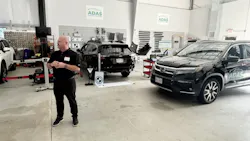 Autel Regional Manager Kevin Oliver prepares to perform a hands-on demonstration of the Autel IA700 ADAS System during Revv's Driving Forward: ADAS & Repair Readiness Summit in Boston at ADAS Diagnostic Solutions in Auburn, Massachusetts.